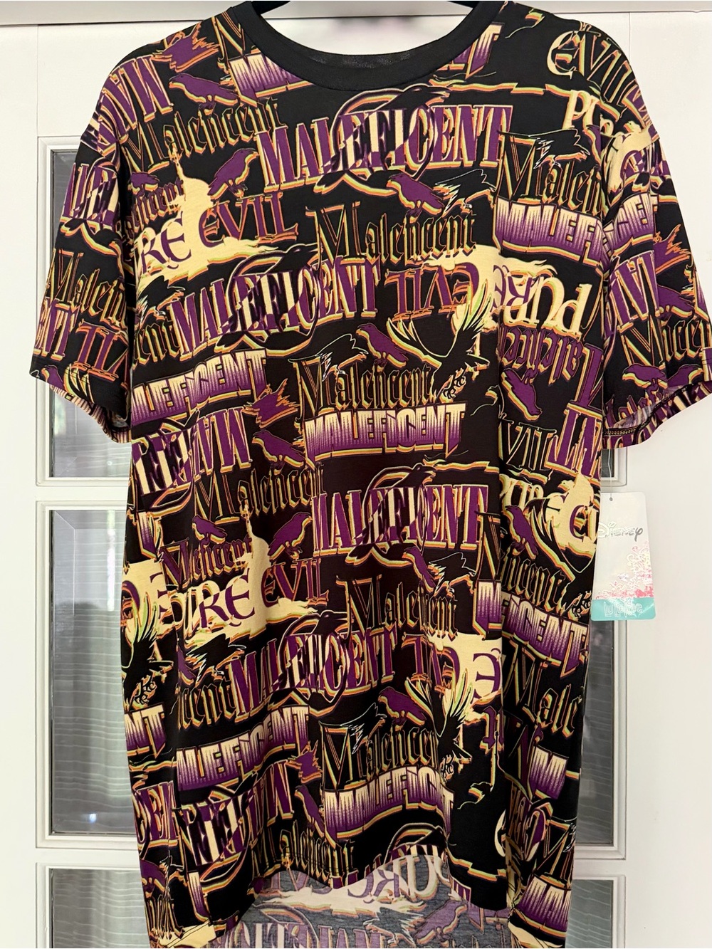 LuLaRoe Maleficent All-Over Graphic Tee — Black, Purple, Orange, & Cream